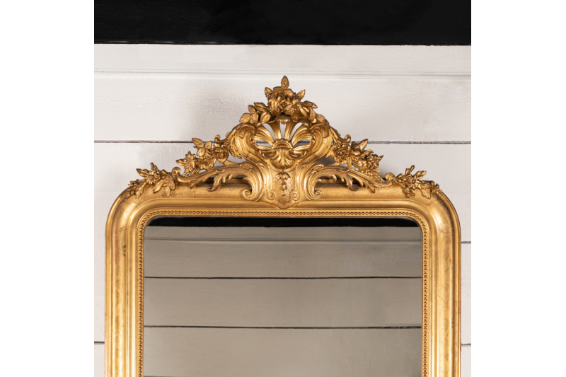 Very large mirror in gilded wood and engraved with floral motifs H.180 cm W.103 cm