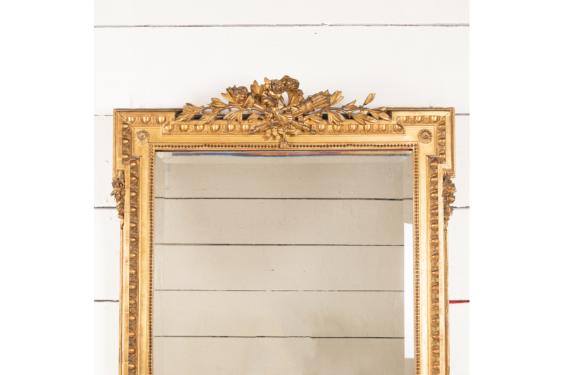 Grand miroir en bois doré - style Louis XVI H.150 cm L.107 cm