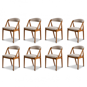 8 Chaises scandinaves en chêne clair...