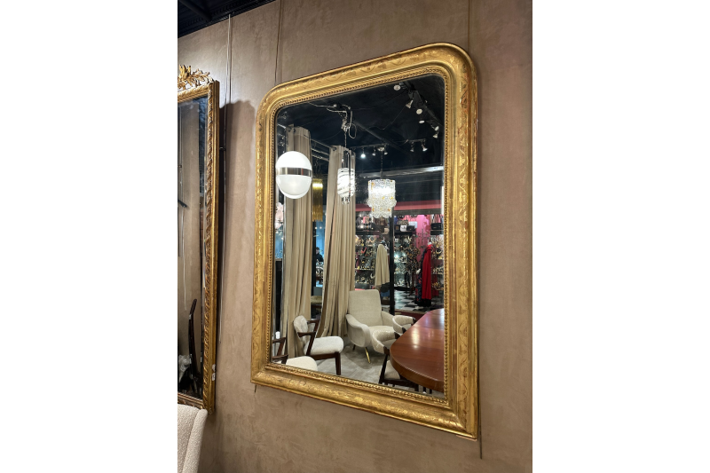 Miroir français en bois doré et décors florals du XIXe H.140 cm
