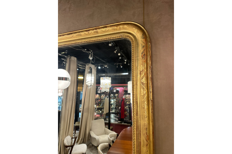 Miroir français en bois doré et décors florals du XIXe H.140 cm