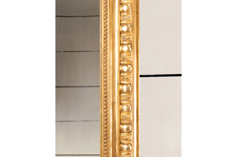 Gilded and carved wooden mirror with gadroons - Louis-Philippe period