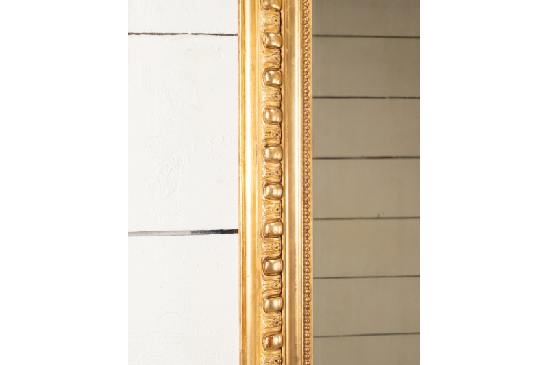 Gilded and carved wooden mirror with gadroons - Louis-Philippe period