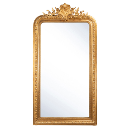 Miroir en bois doré et sculpté décor...