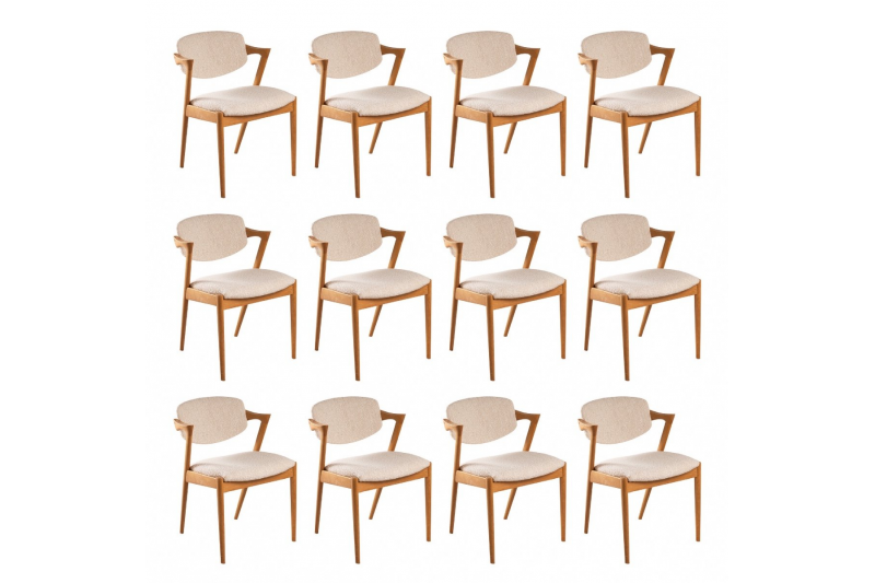 12 Solid oak chairs 1960